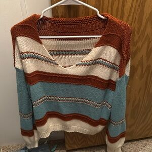 Size large 
Cute sweater